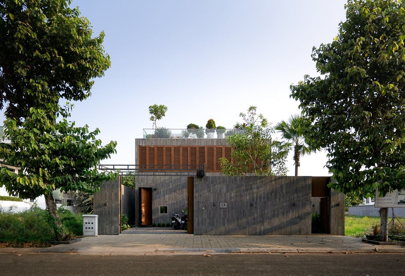 Nha Tran Villa: Tropical Asian-Inspired Modern House in Vietnam