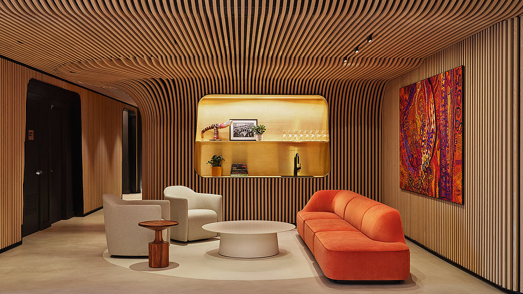 Sleek wooden slat walls and vibrant orange sofa create a warm, modern living space.