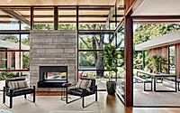 002-canopy-house-fluid-indoor-outdoor-design-amid-oak-tree-canopy.jpg