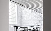 002-monolot-offices-a-minimalist-industrial-transformation-in-prague.jpg