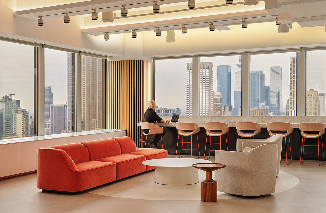 Striking modern office with panoramic city views, warm wood accents, and sleek furnishings.