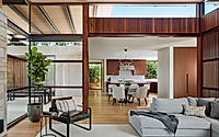 003-canopy-house-fluid-indoor-outdoor-design-amid-oak-tree-canopy.jpg