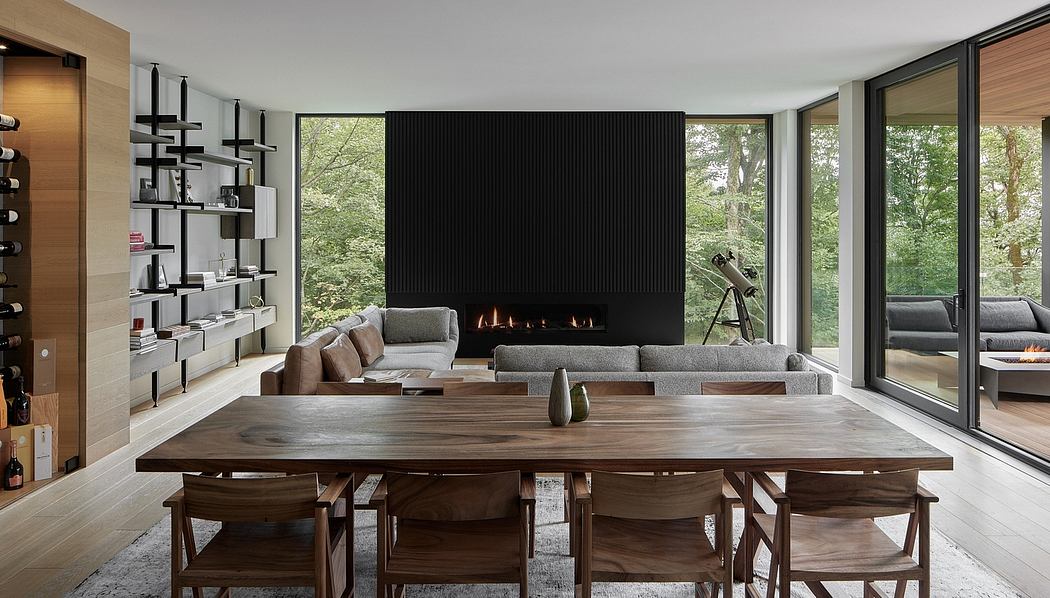 Spacious modern living room with large windows, sleek fireplace, and minimalist shelving.