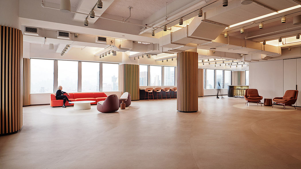 Spacious modern office with wooden accents, sleek furniture, and expansive windows.