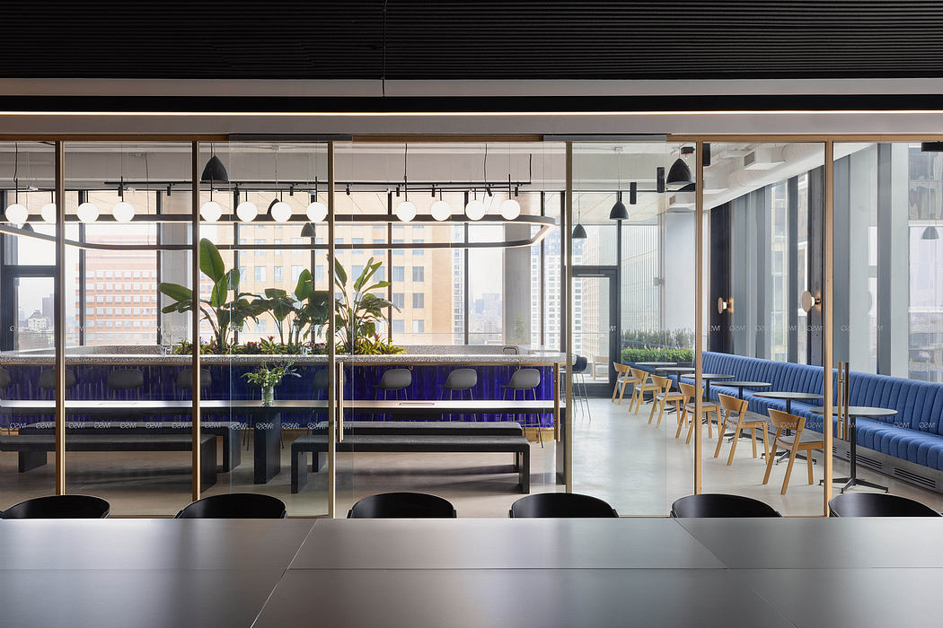 Sleek modern interior with vibrant plants, bench seating, and minimalist lighting.