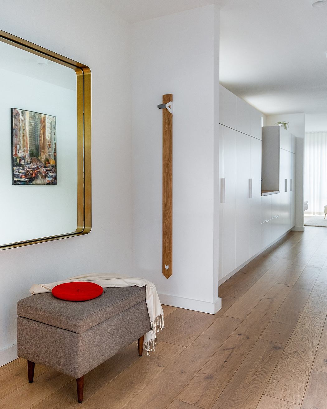 Warm-toned wooden details, clean minimalist design, and mid-century inspired furnishings.