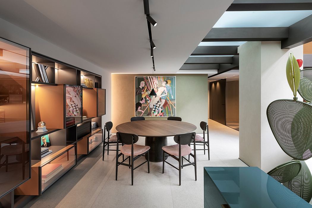 Sleek, modern interior with eclectic furniture, artwork, and architectural details.