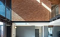 006-myj-house-eco-friendly-residential-design-with-exposed-brick.jpg