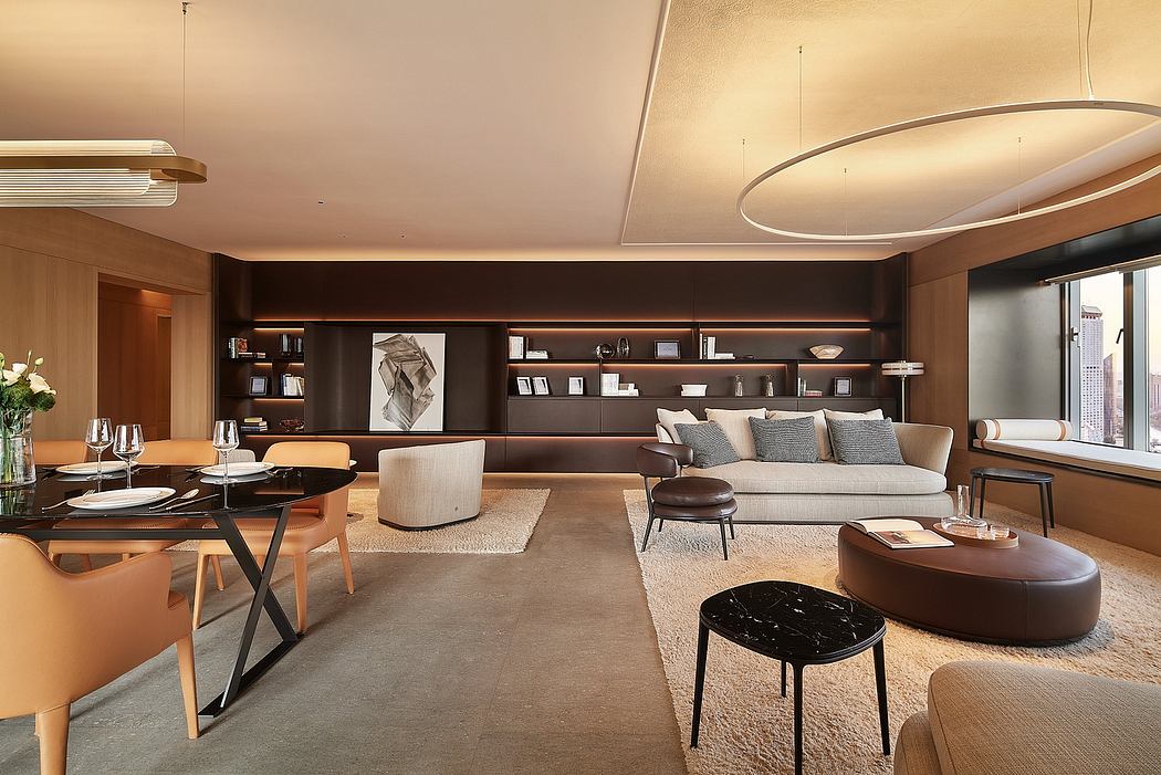 Modern, sophisticated living room with warm lighting, cozy seating, and sleek decor.