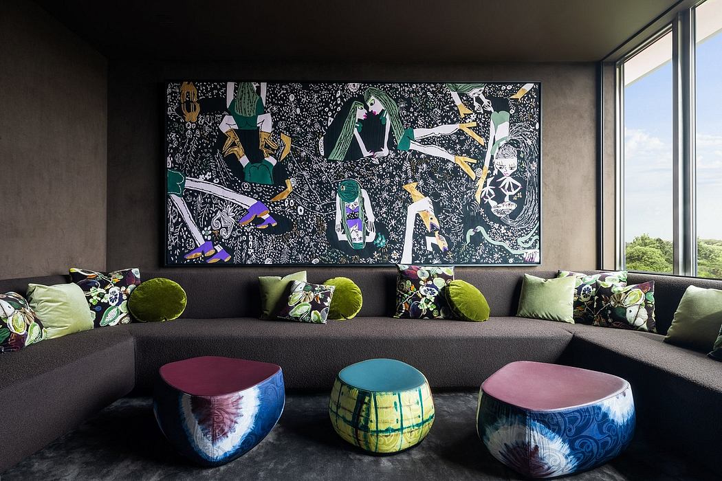 Dramatic, contemporary living space with bold abstract artwork, plush seating, and vibrant decor.
