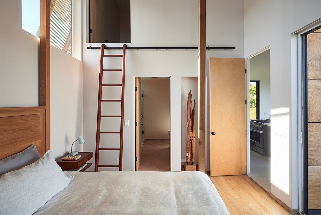 Rustic, minimalist bedroom with wooden ladder, built-in storage, and natural lighting.