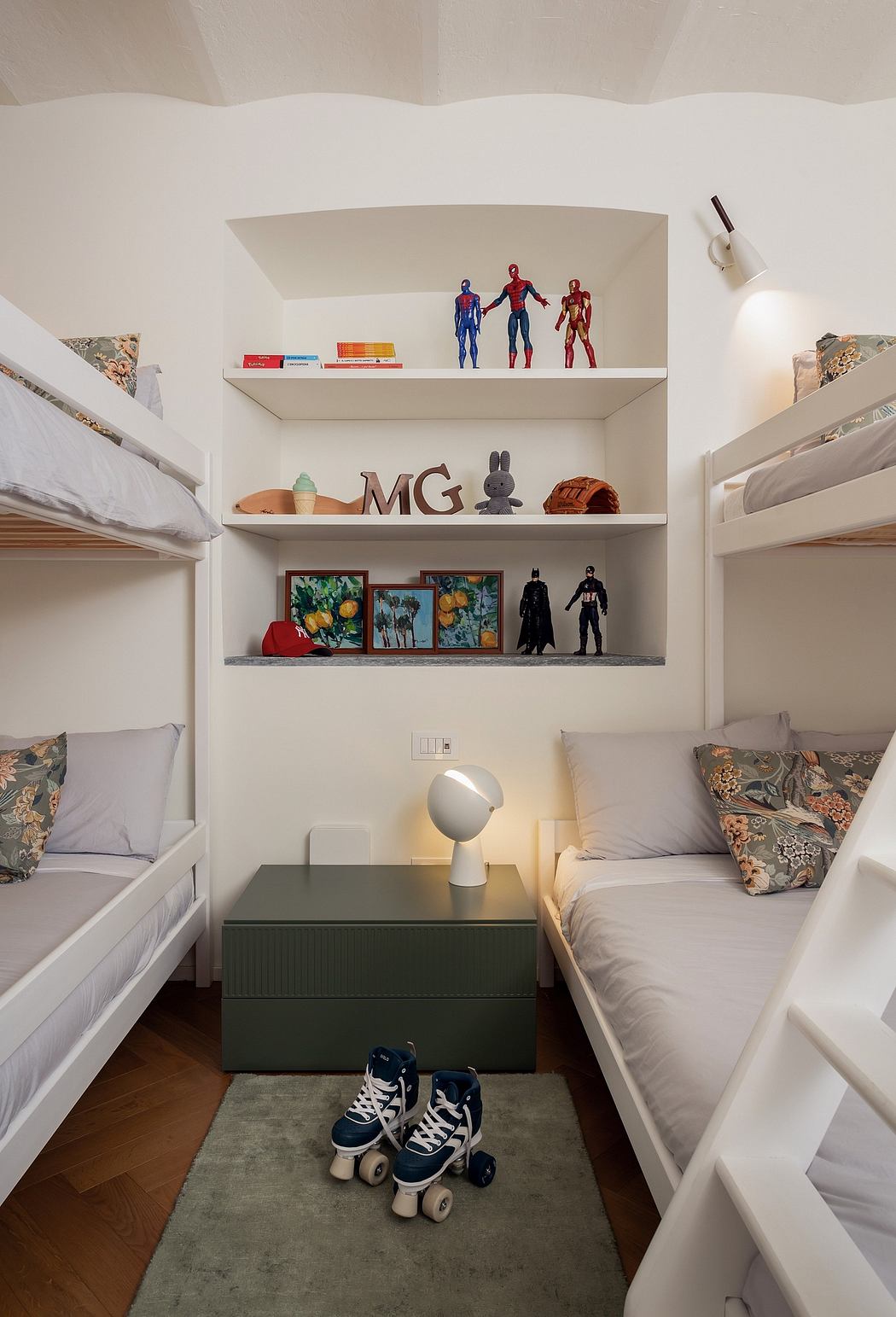 Cozy bunk bed setup with shelves displaying figurines, artwork, and personal items.