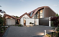 009-concrete-copper-home-sculptural-roof-design-in-nz.jpg