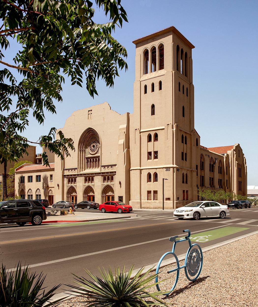 A majestic historic building with intricate architectural details, including arched windows and tower.