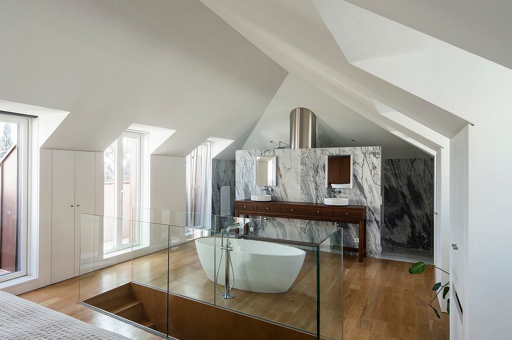 A modern, airy bathroom with sleek marble walls, a freestanding bathtub, and glass partitions.