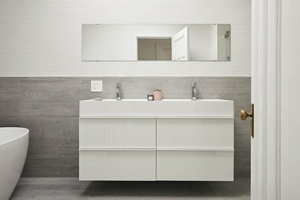 Sleek, minimalist bathroom vanity with clean lines and a floating design.