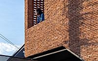 012-myj-house-eco-friendly-residential-design-with-exposed-brick.jpg
