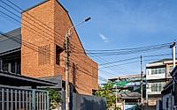 013-myj-house-eco-friendly-residential-design-with-exposed-brick.jpg