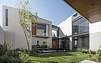 015-sama-house-a-stunning-blend-of-concrete-wood-and-nature.jpg