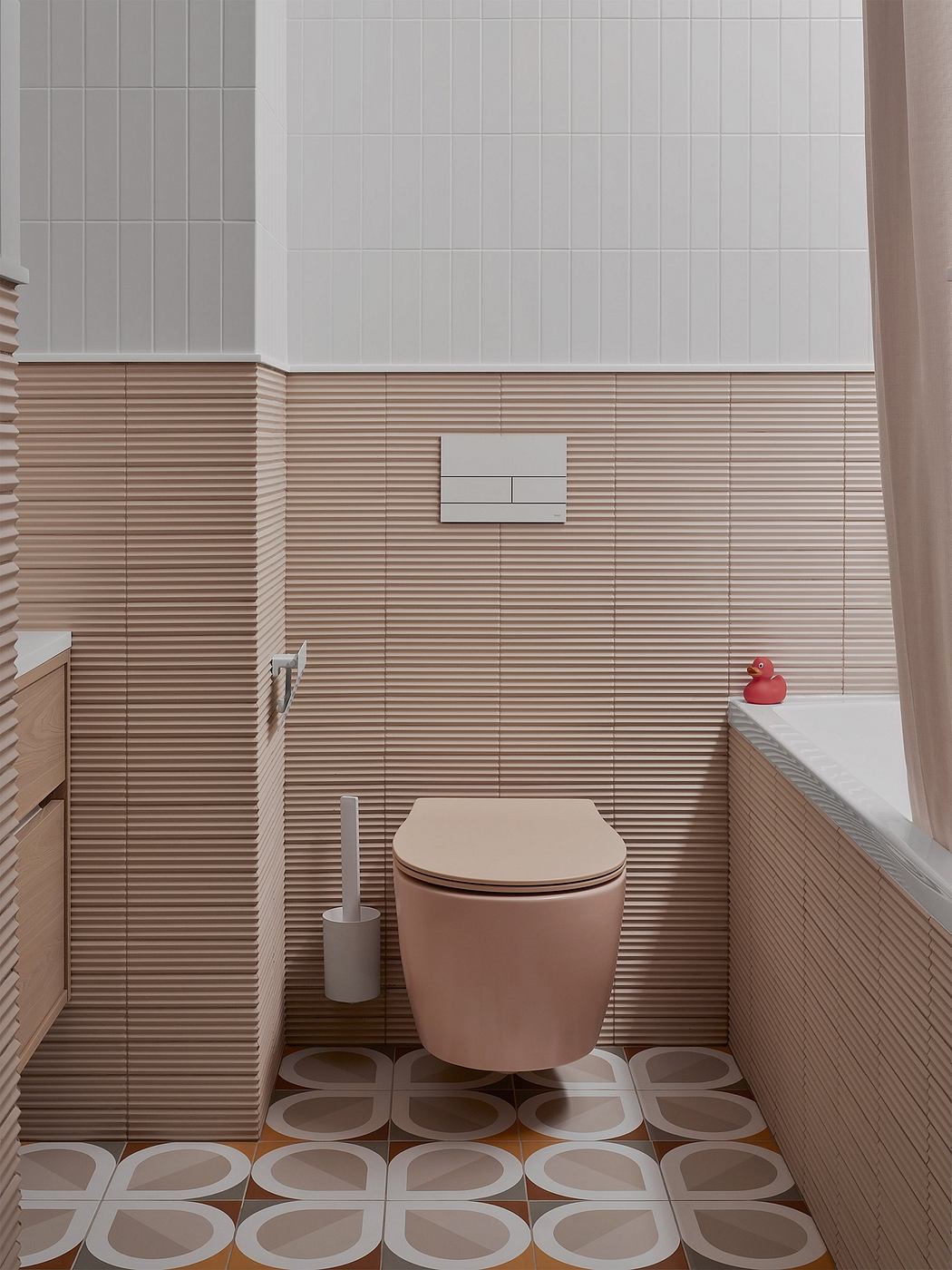 Minimalist bathroom design with sleek wood paneling, geometric tiles, and a red rubber duck.