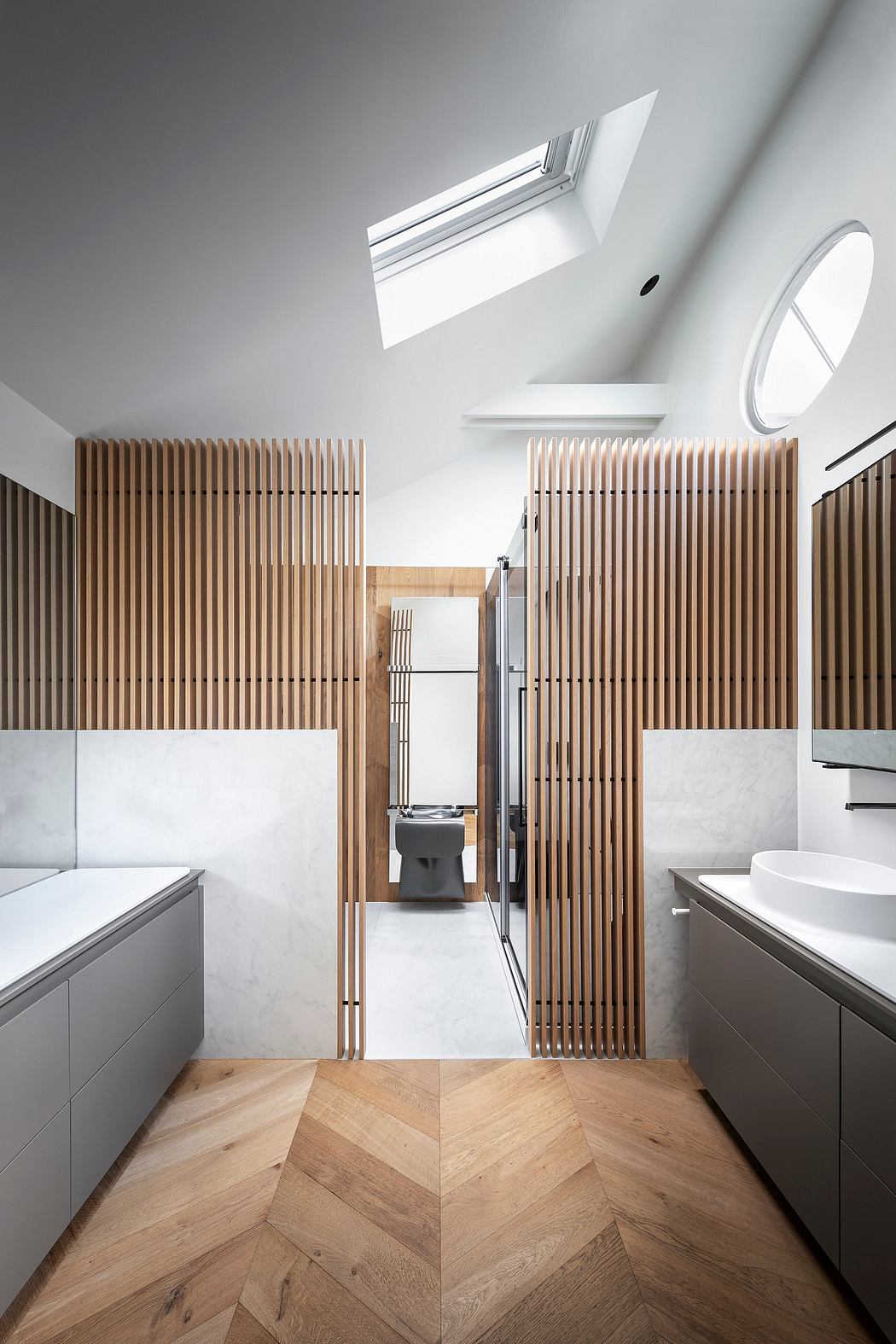 A modern bathroom design featuring wooden slats, marble tiles, and recessed lighting.