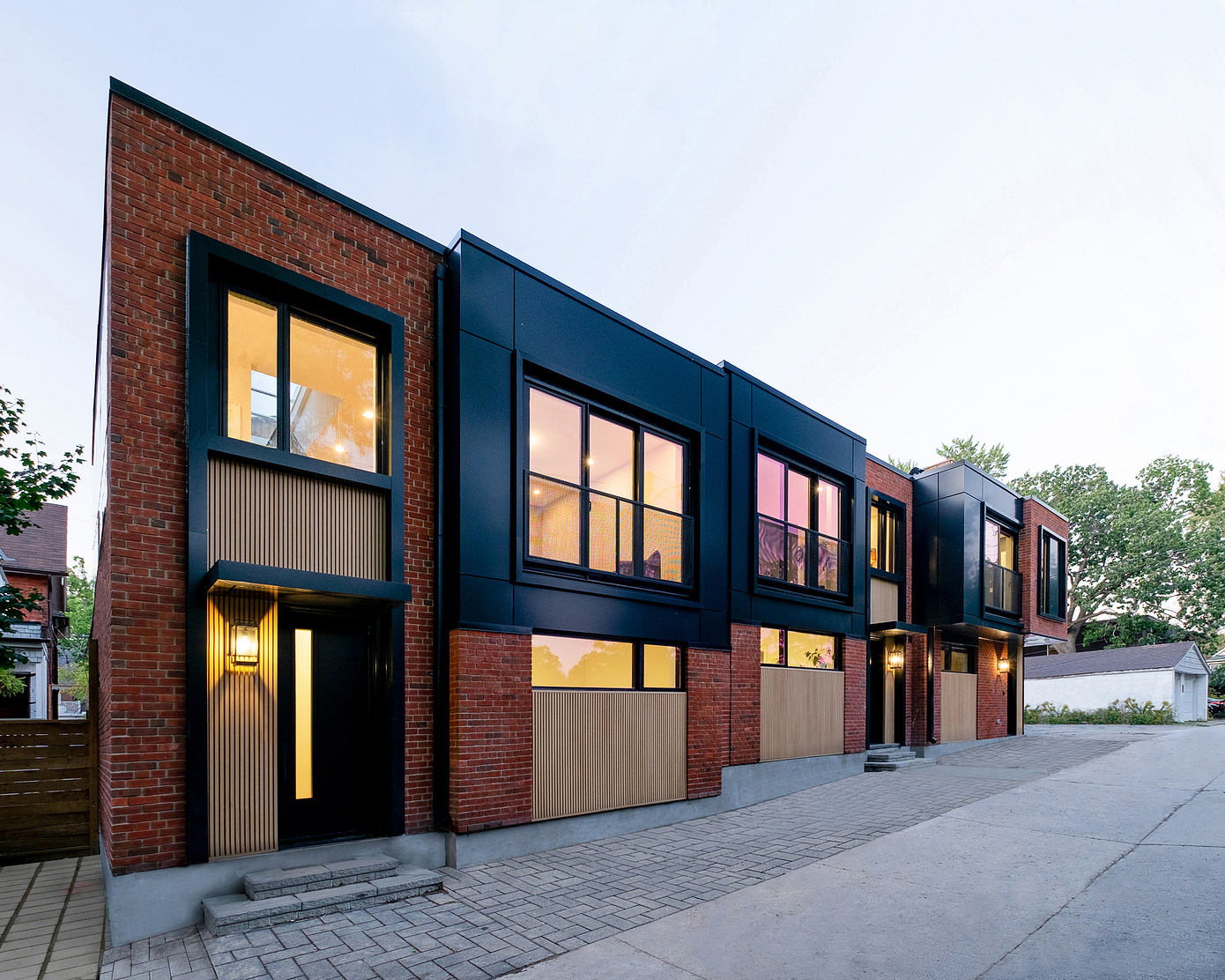 Norwood Park Laneway Homes: Cohesive Design Across Three Properties