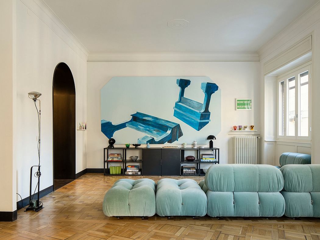 Stylish contemporary living room with vibrant teal sofa, shelving, and bold artwork.