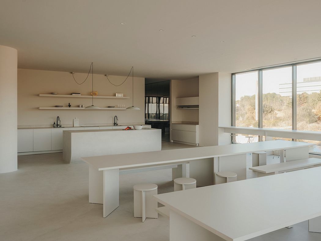 Minimalist interior design with clean lines, open concept kitchen and dining area.