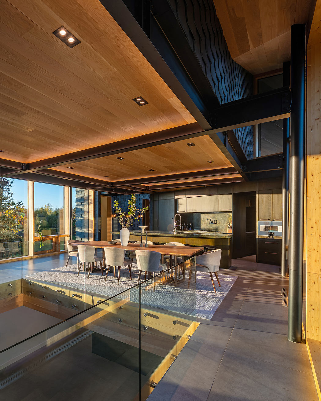 Stunning modern wooden interior with sleek glass and steel accents, open-concept layout.