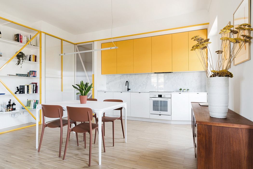 Modern kitchen with bright yellow cabinets, wood furnishings, and minimalist decor.