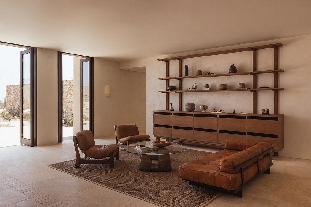 Cozy mid-century modern living room with wooden shelving, plush leather furnishings.