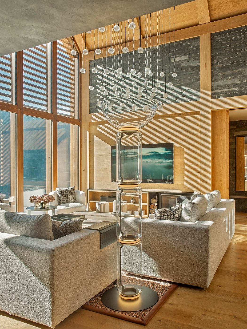 Stunning modern living room with wooden beamed ceiling, glass chandelier, and large windows.