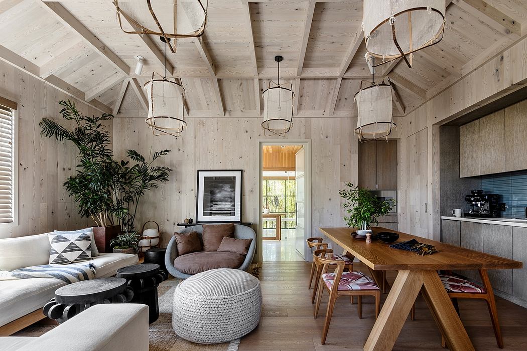 Rustic yet modern interior with wooden beams, natural lighting, and stylish furniture.