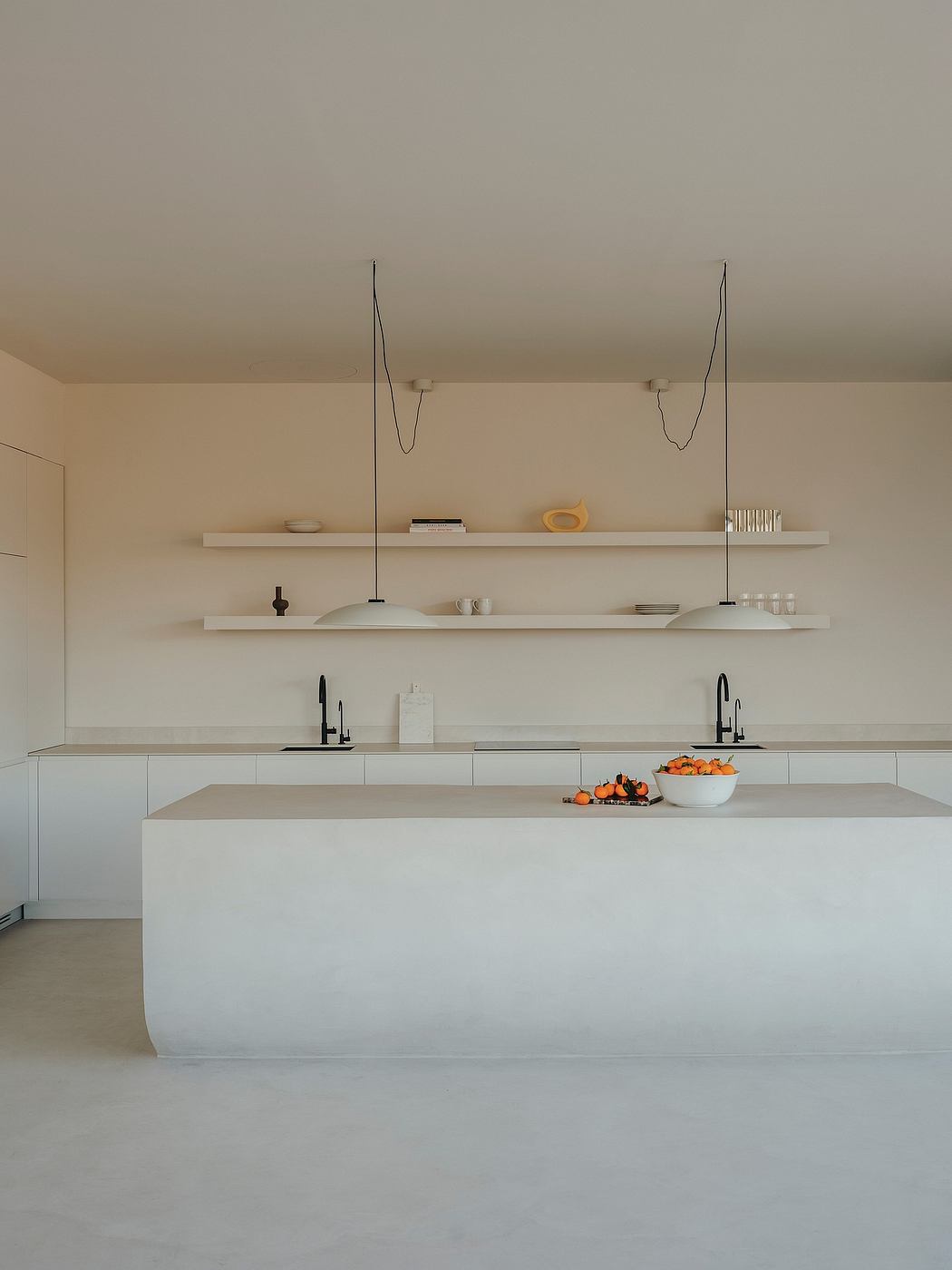 A minimalist kitchen with white cabinetry, sleek shelves, and black accent fixtures.