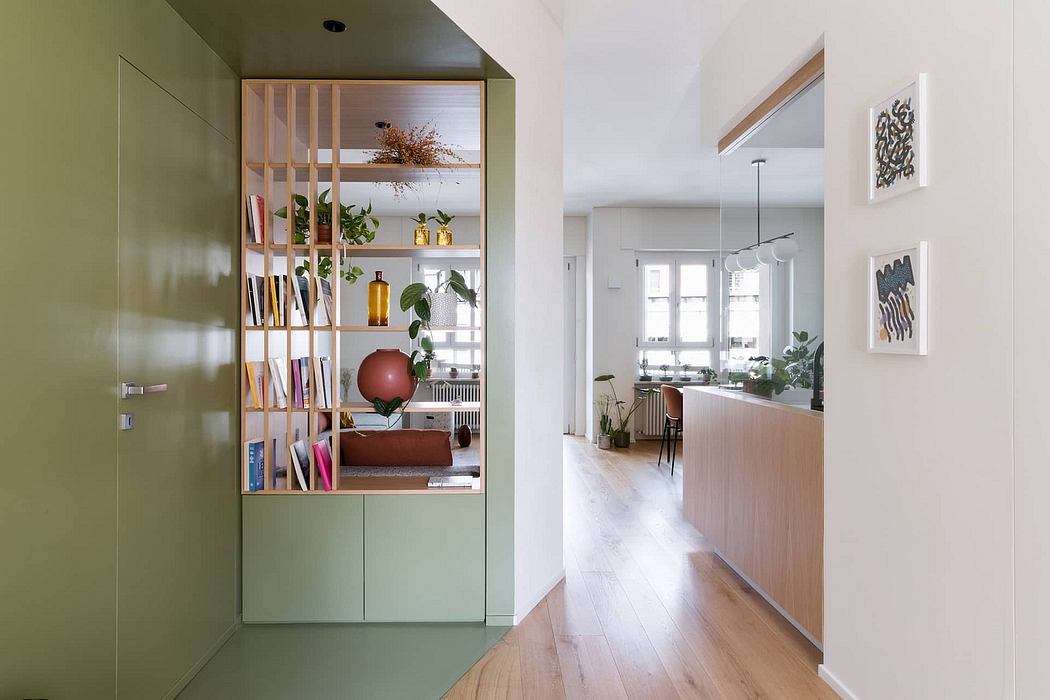 Minimalist apartment interior with wooden shelving, potted plants, and abstract artwork.