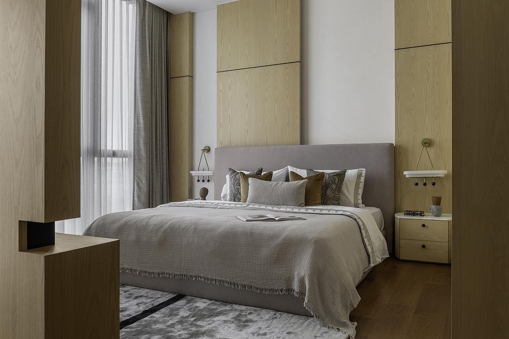 Contemporary bedroom with modern wooden paneling, neutral tones, and clean lines.