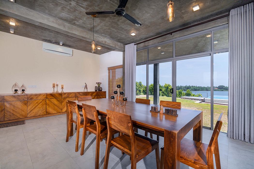 Rustic yet modern dining area with wooden furnishings, elevated ceiling, and panoramic views.