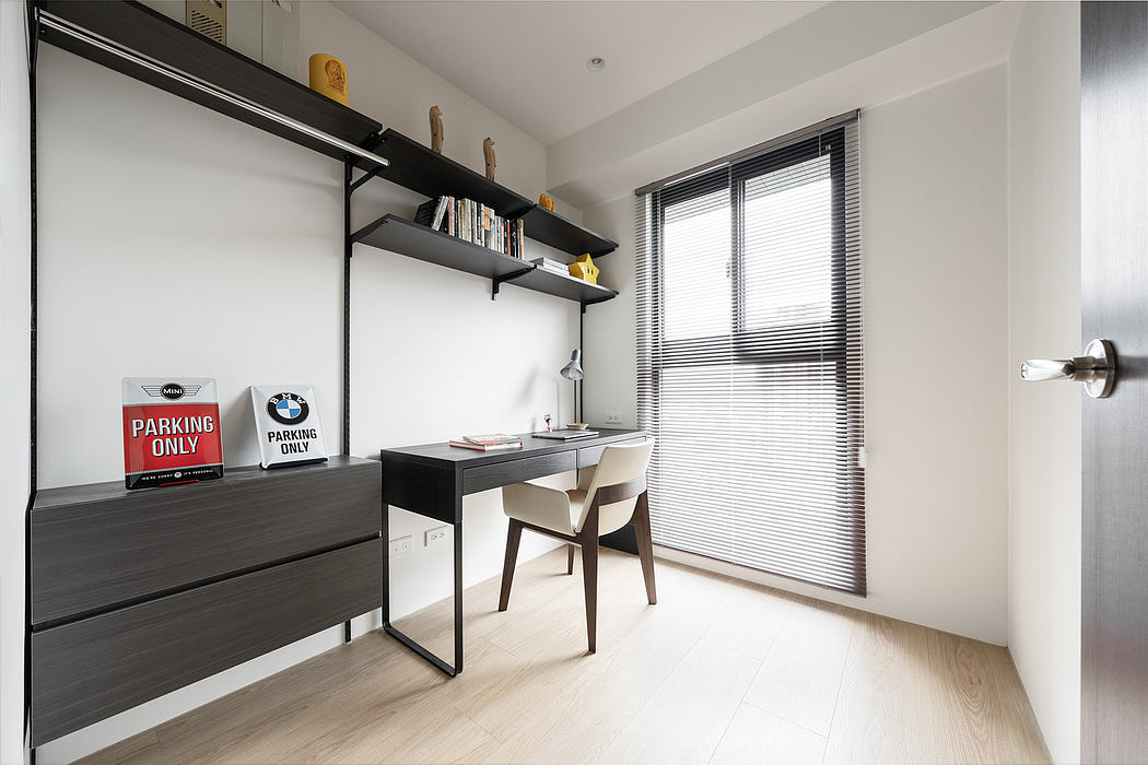 Sleek, modern home office with minimalist shelving, desk, and BMW-branded parking signs.