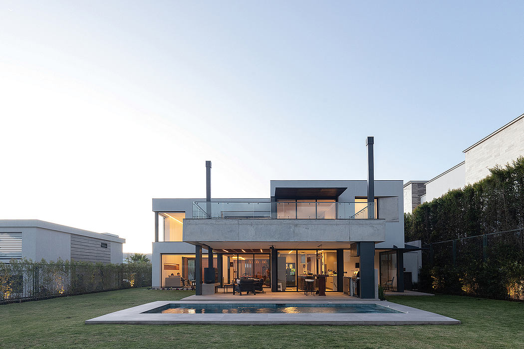 Sleek, modern home with an open floor plan, a pool, and ample outdoor space.