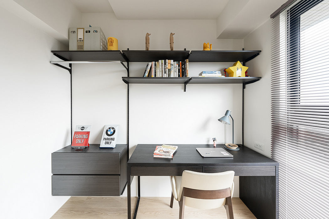 Clean, modern home office with built-in shelves, minimalist desk, and neutral decor.