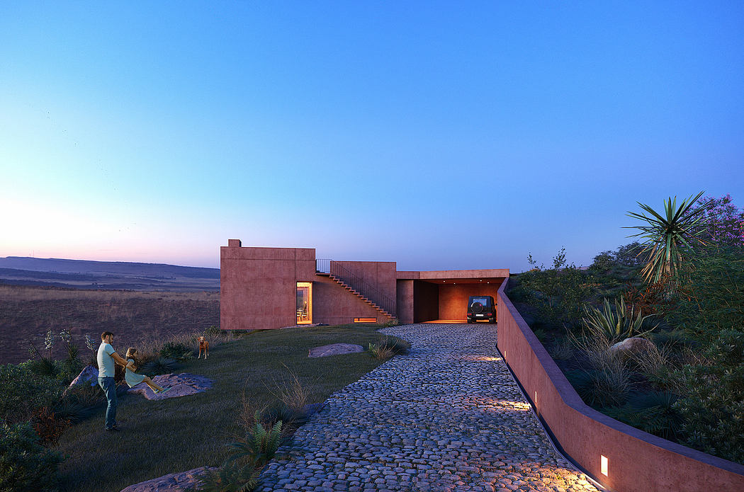Expansive modern home nestled in lush landscape, with dramatic architectural features.