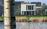 008-wood-and-natural-stone-house-derksen-windt-architectens-modern-amsterdam-oasis.jpg