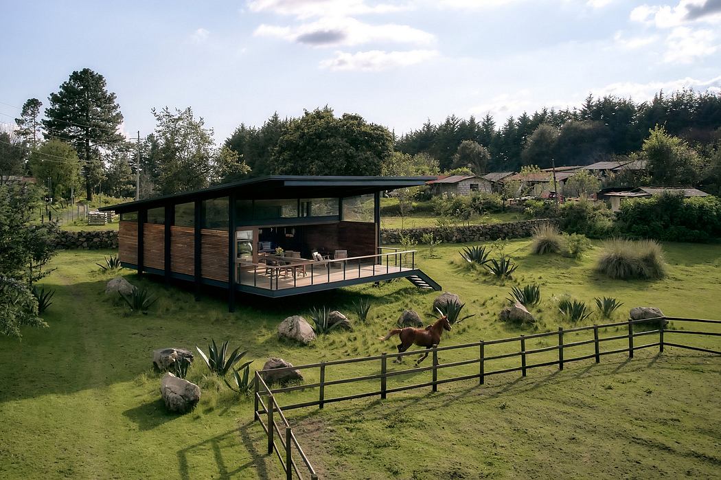 A modern, elevated cabin nestled in a lush, forested landscape with a grazing deer.