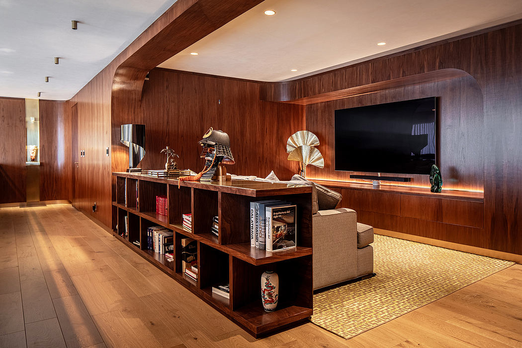 Warm, wooden paneled room with built-in shelving and decorative elements.