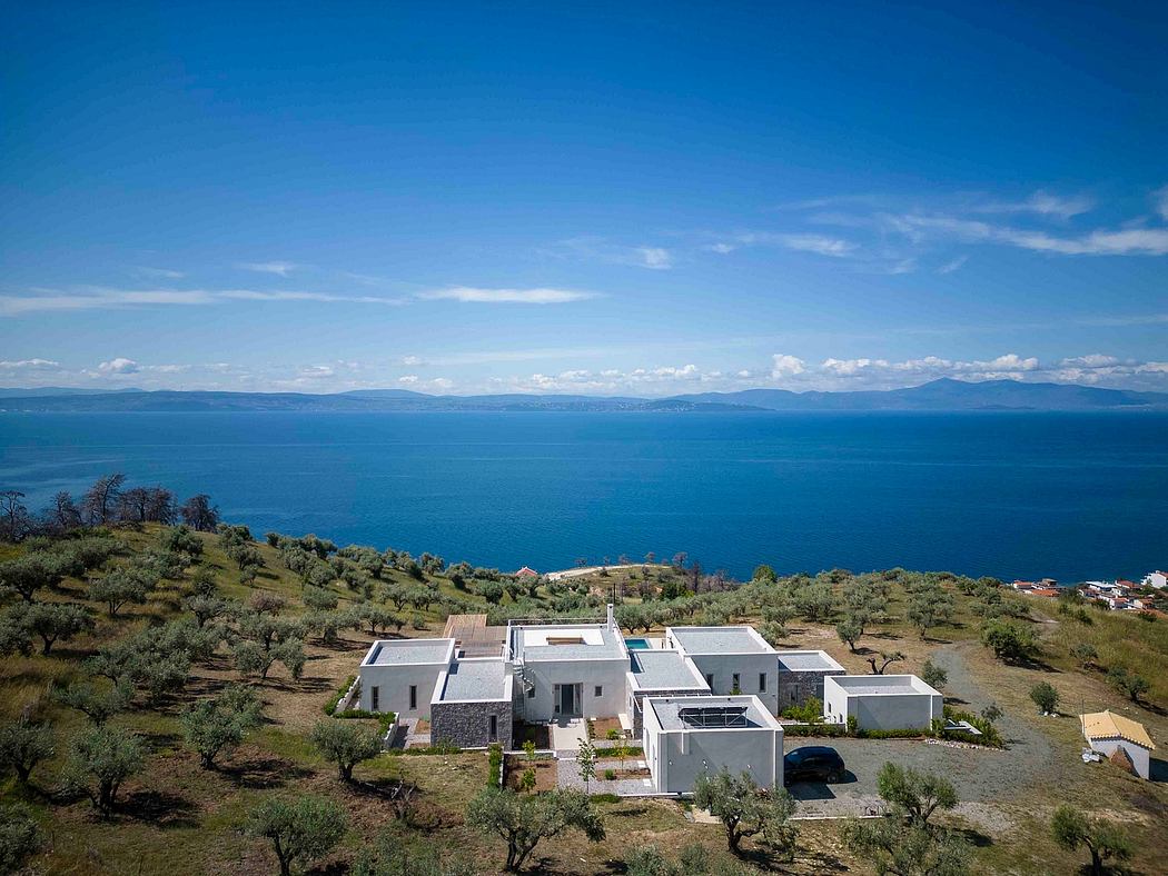 Stunning modern architecture nestled in a picturesque coastal landscape.