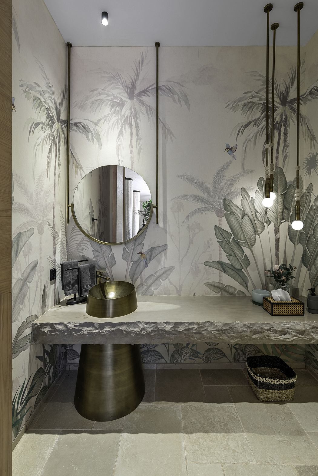 Tropical-inspired mural adorns this modern bathroom with sleek vanity and statement lighting.