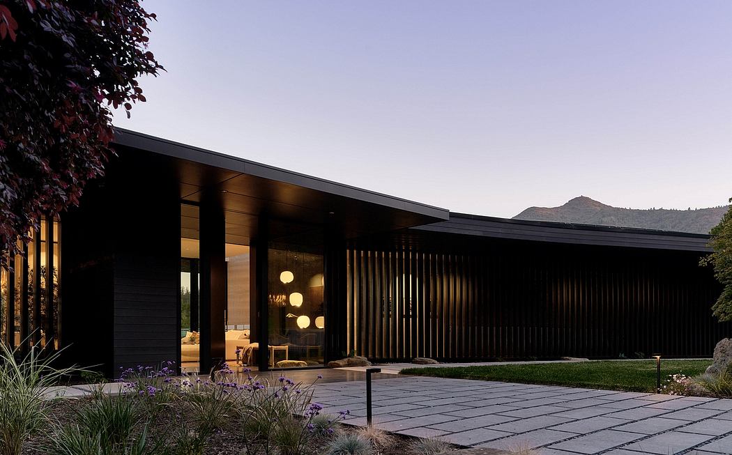 Modern architectural design with sleek lines, wood accents, and landscaped gardens.