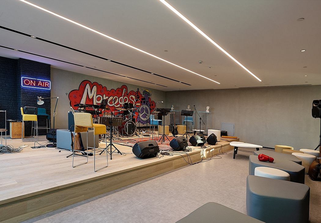 A modern recording studio with sleek lighting, wooden floors, and musical equipment.