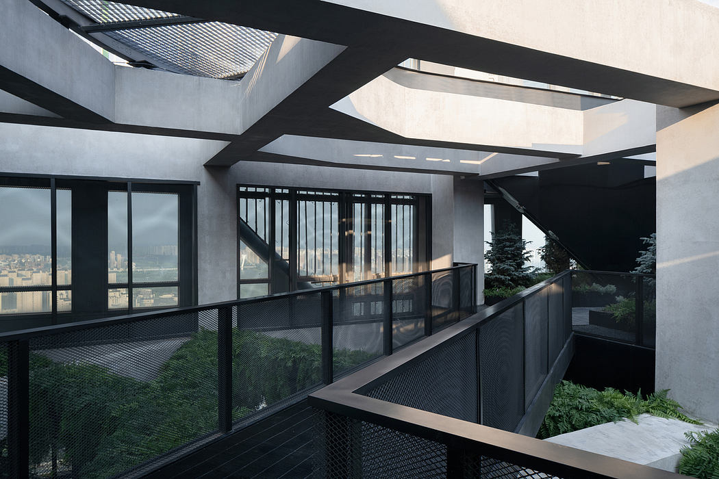 Impressive modern architecture with intricate metal framing, expansive windows, and lush greenery.