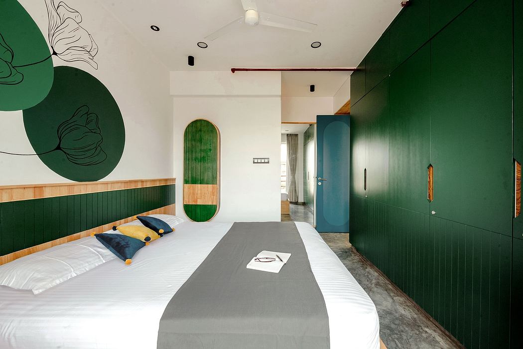 A modern bedroom with vibrant green accents, geometric patterns, and minimalist furnishings.